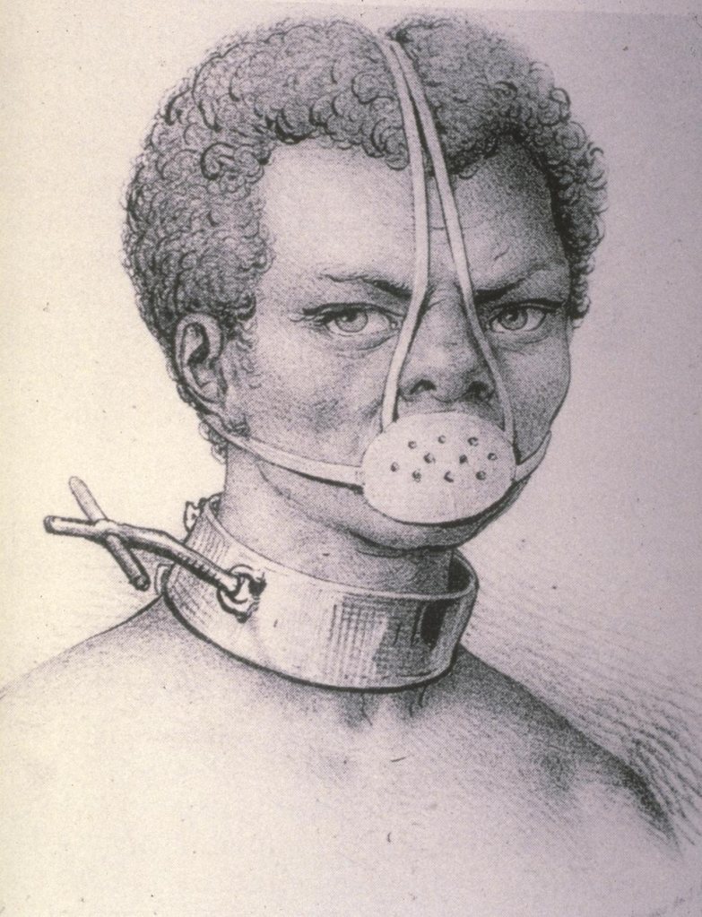 Köleliğin simgesi maske. Sömürgeci batılı efendisi tarafından cezalandırılan köleye demir ağızlık takılıyor.